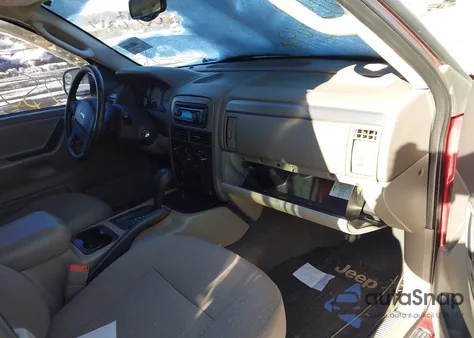 2004 Jeep Grand Cherokee Laredo z USA, uszkodzony, nr VIN 1J4GX48SX4C144063